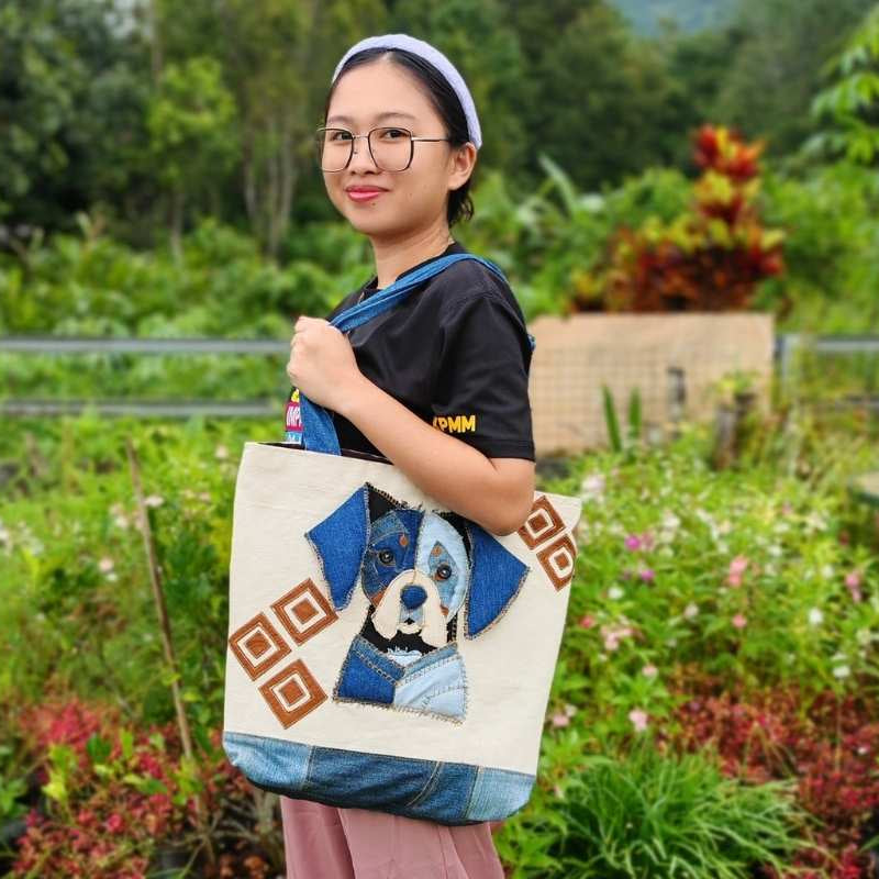 one of the rural woman with her handmade upcycled tote bag