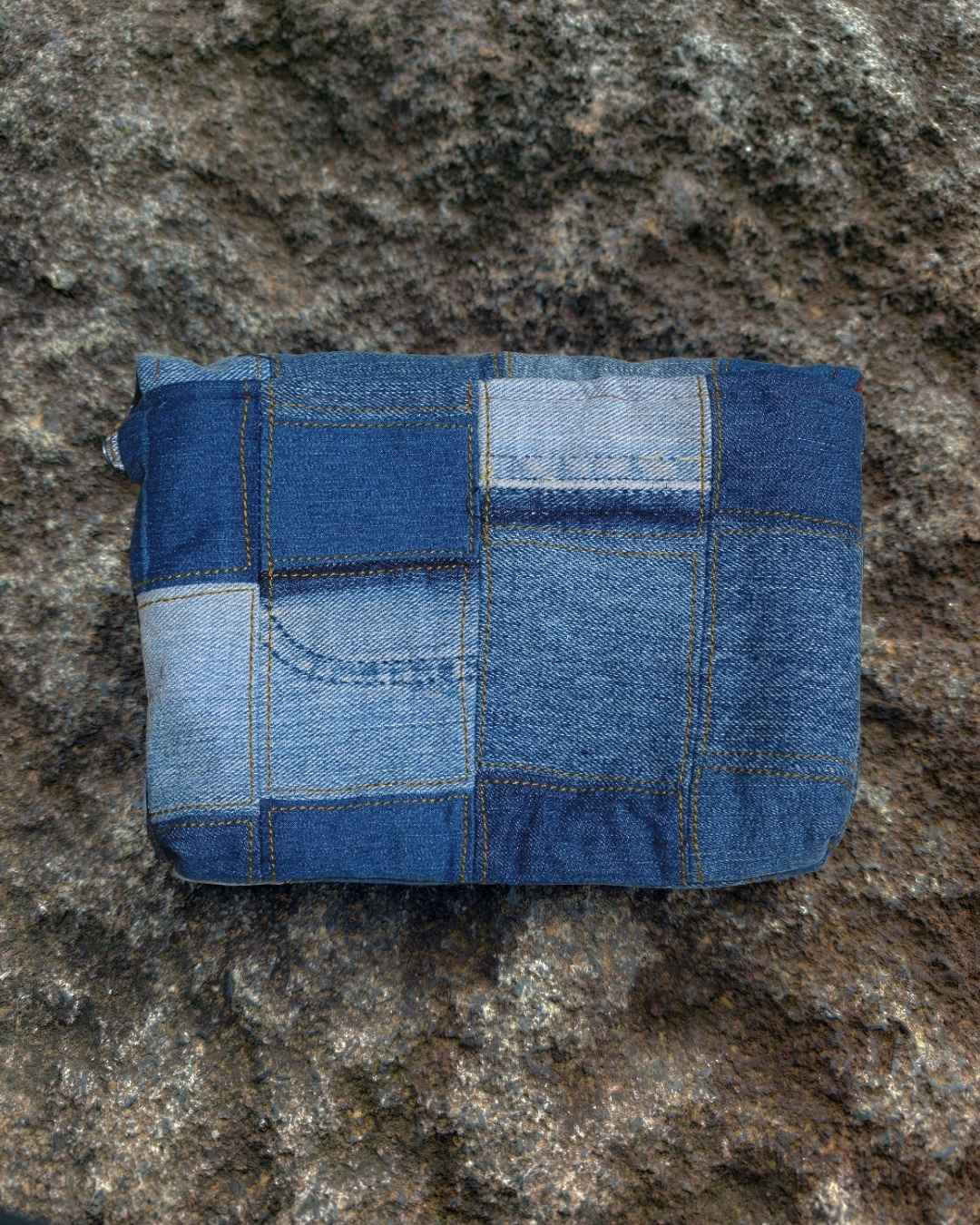 Back view of product, showcasing its patch work denim design.