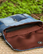 Soft-lined interior with a convenient side zip pocket for added organisation.