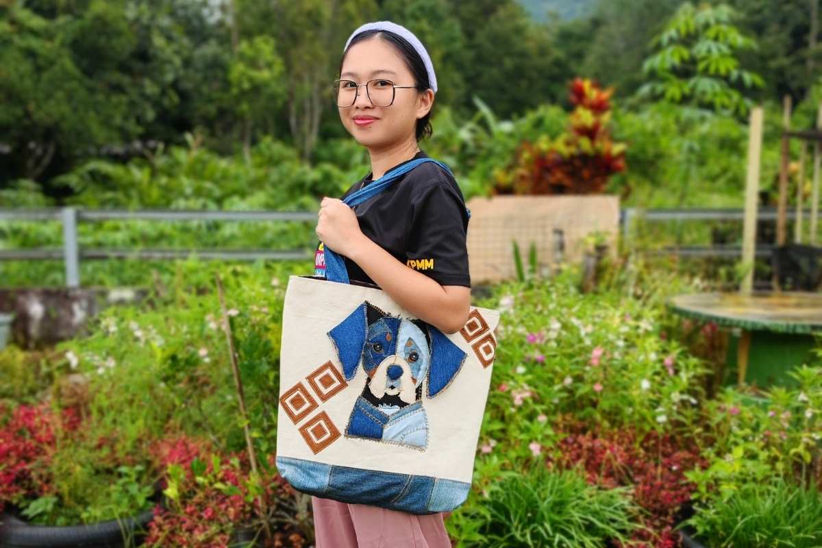 one of the rural woman with her handmade upcycled tote bag
